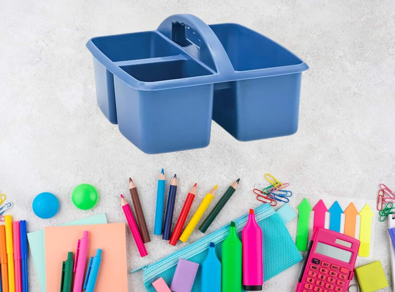 Blue homework supply caddy with compartments surrounded by colorful school supplies including pencils, markers, sticky notes, paper clips, and a calculator