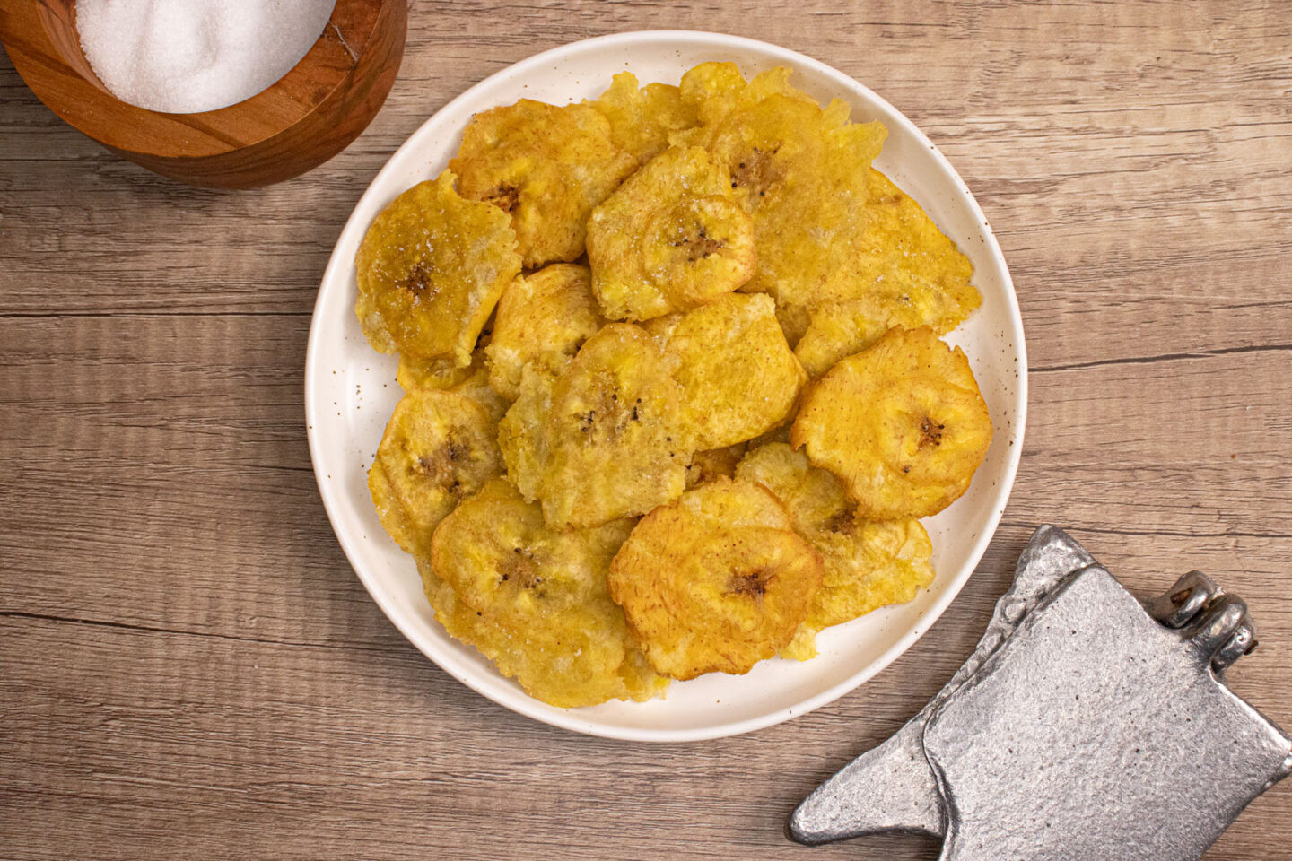 Crispy Dominican tostones made from fried green plantains