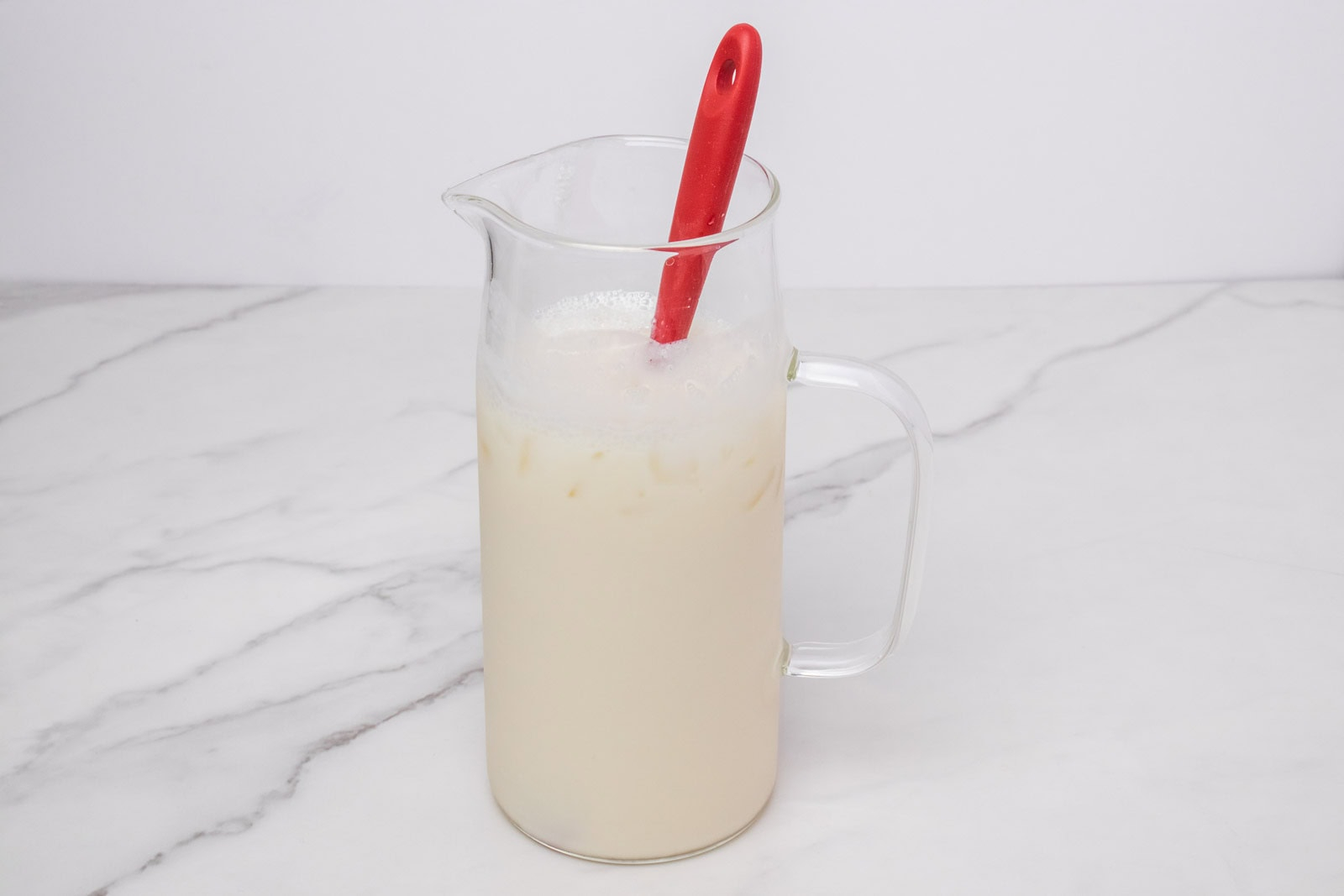 Finished Morir Soñando de Limón in a glass pitcher with ice.