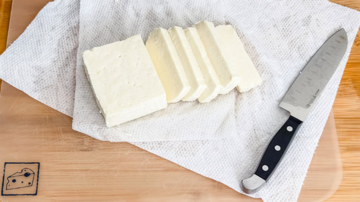 Queso de freír cut into thick rectangular slices before coating